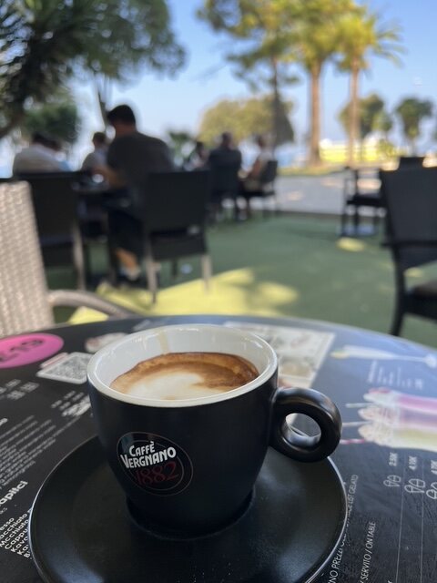 Coffee beside the palm-lined waterfront in Zadar